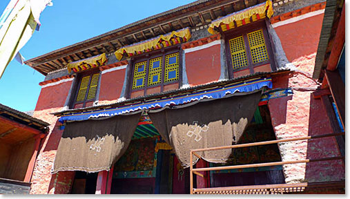 We started our day with a hike to upper Pangboche and a visit to the Pangboche Monastery. Pangboche is home to a 600-year-old monastery (the first in the Khumbu Valley). Built around a rock where a famous lama once meditated, the dim interior is filled with old statues, crumbling relics, wrathful deities behind locked doors, and the exaggerated faces of carved masks used in ritual summer dances.