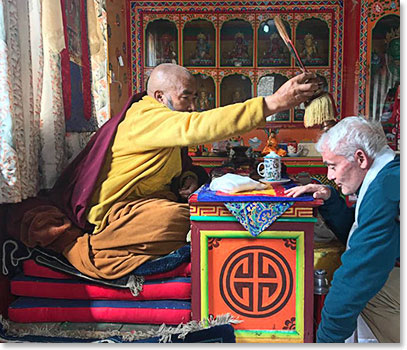 Frank Giustra being blessed by Pangboche Lama