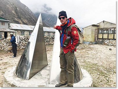 Tim Young at the memorial to climbers who have died on Everest. Fascinating compelling design. Names of those who did not return from their expedition are listed in the inside walls