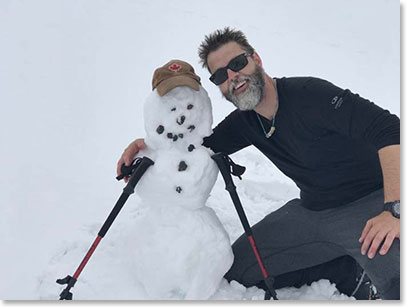 Shannon built a snowman on the way to Pastukhov Rocks (15,585ft/4,750m)