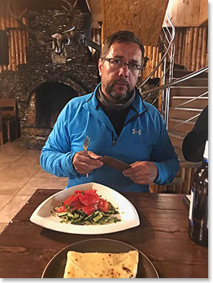 Joe at Azau, base of Elbrus ski lifts, having a late lunch