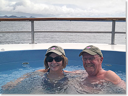 Melody and Bob relaxing on our boat after a great day hike