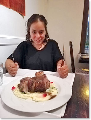 After months of travel in South America and days and days of high altitude climbing on Aconcagua Kara orders an Argentine steak.  Looks like she is up for the task! 