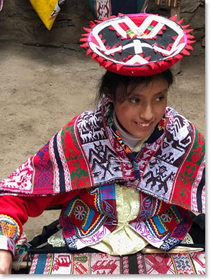 Young girl in Chacashskra learns early the tradition of weaving 