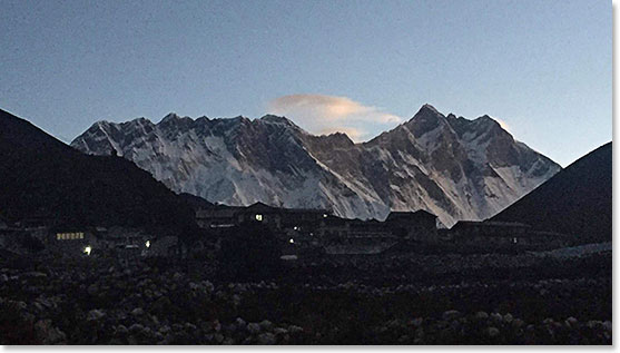 Everest in the middle behind, Lhotse, the 4th highest peak in the world, on the right.