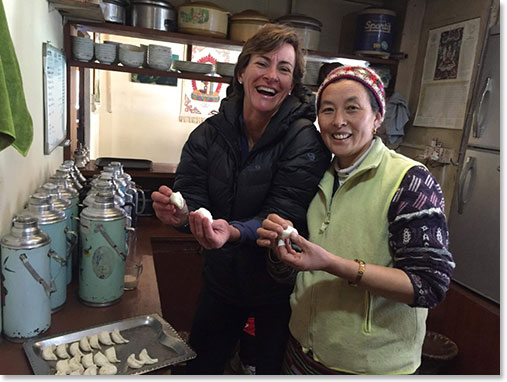 In the kitchen, Adriana got lessons in how to prepare Mo Mo's from Yangee.