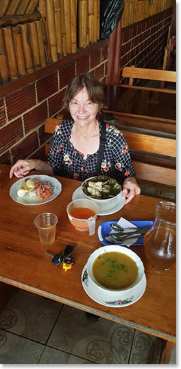 An Ecuadorian feast of soup, fresh vegetables and guinea pig 